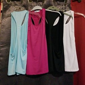 Bundle of 4 razor back work out tanks NWOT